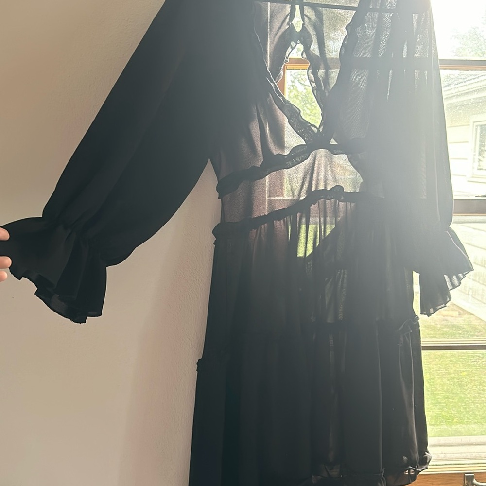 Black long sleeve with open back